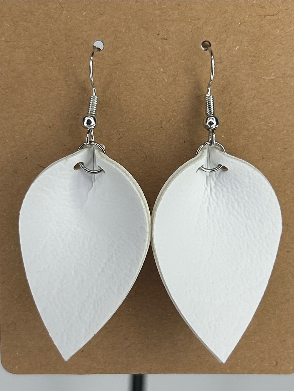 White Layered Teardrop Pinch Peddle Faux Leather Earrings